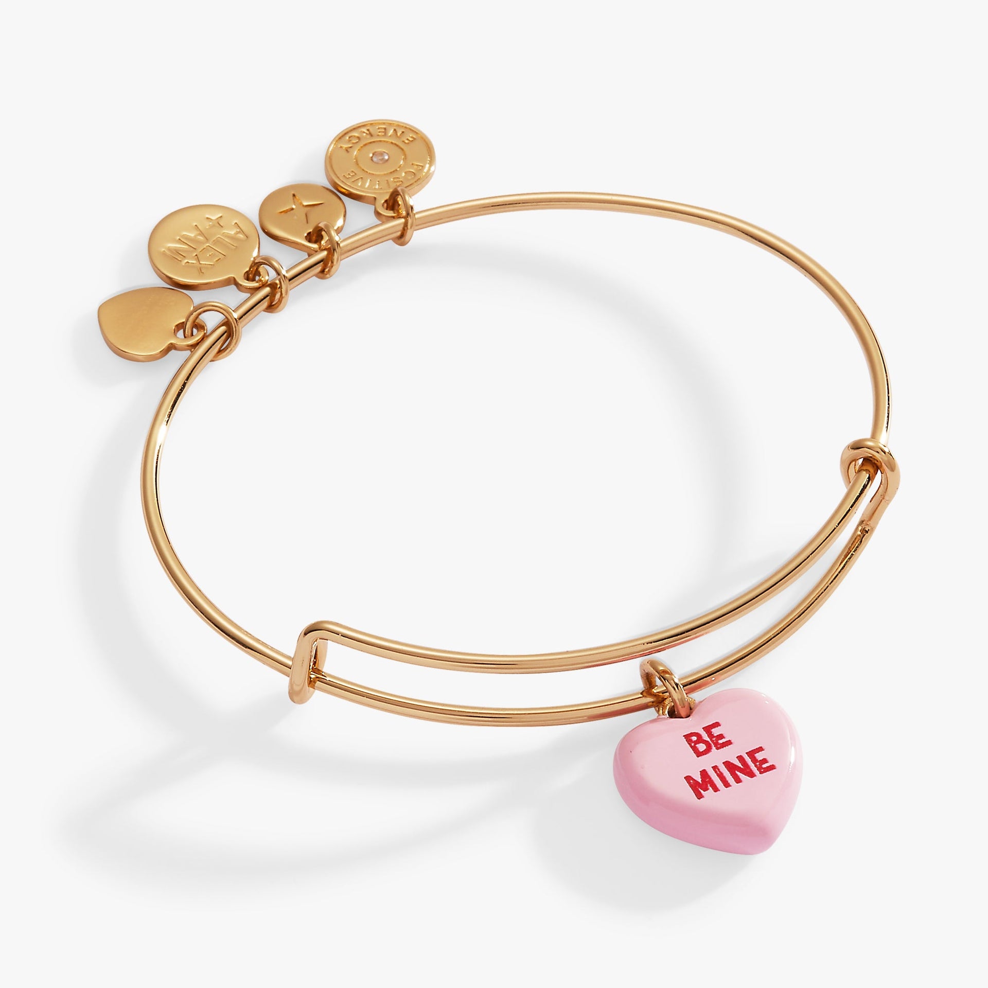 Expandable wire bangle featuring a pink heart-shaped candy charm engraved with 'Be Mine'.
