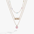 Triple-strand gold-tone necklace featuring inline multicolored heart crystals
