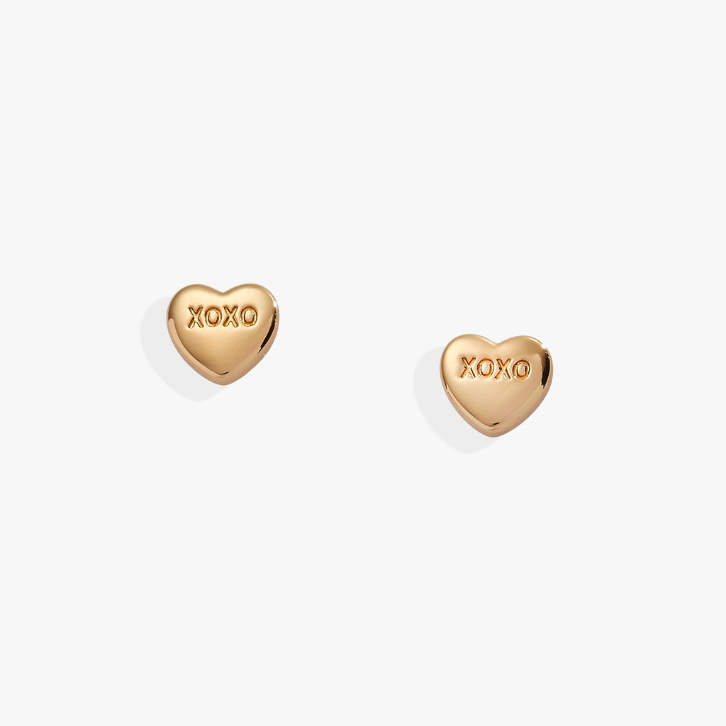 Alex and Ani gold-tone XOXO heart stud earrings inspired by Sweethearts candy.