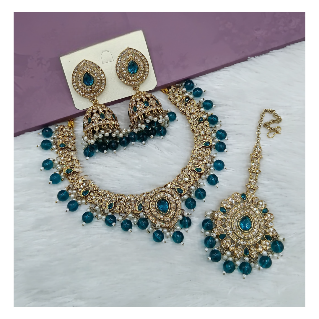 Teal blue stone necklace set with matching earrings, perfect for festive wear.