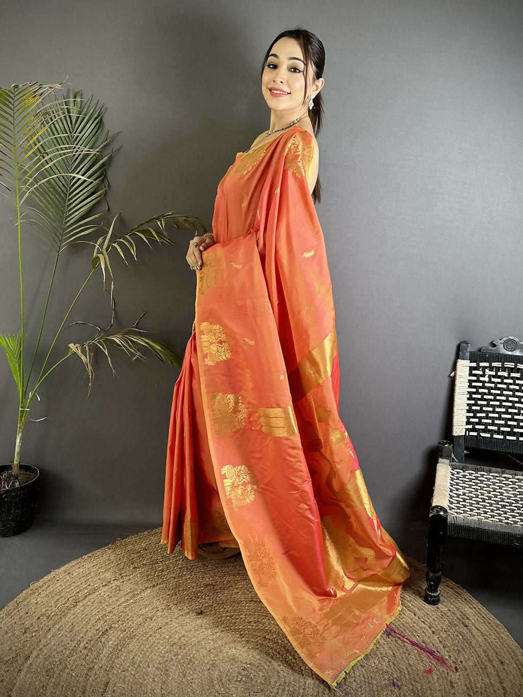 Orange Soft Silk Banarasi Saree with Intricate Zari Motifs