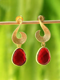 Matte gold drop earrings with a vibrant red stone detail