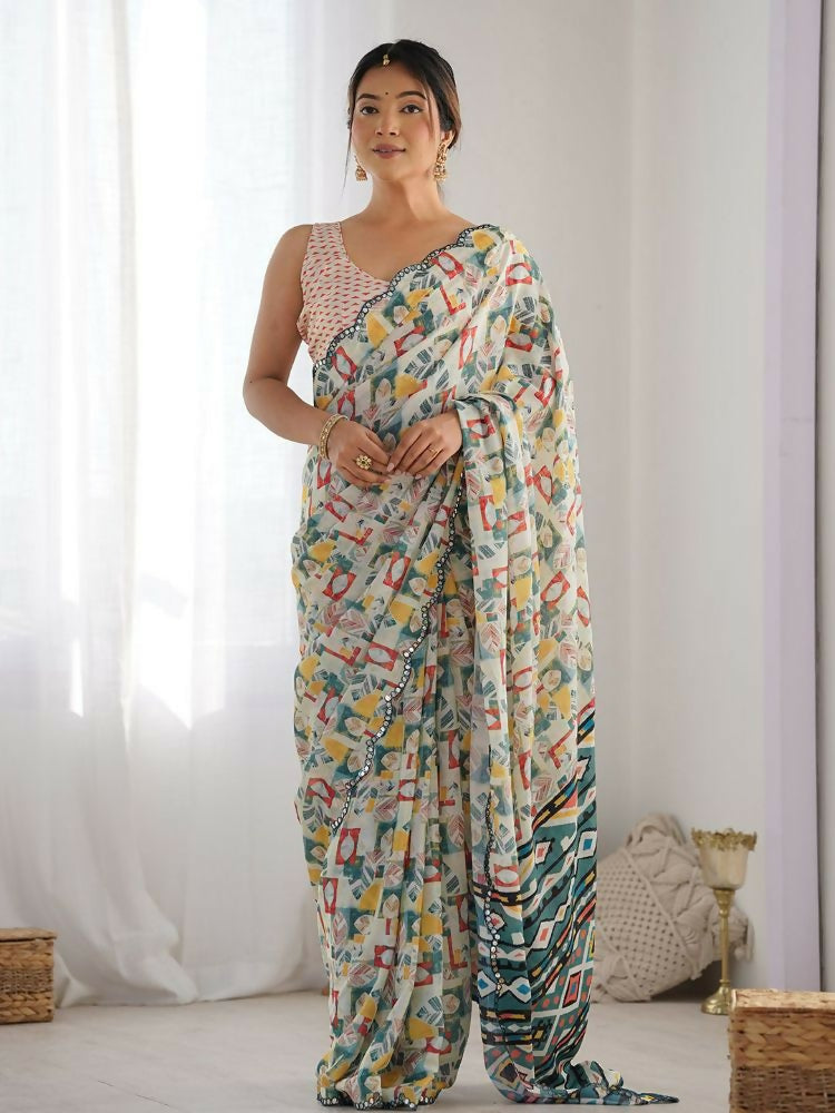 White Multi Georgette saree with vibrant digital prints and mirror work.