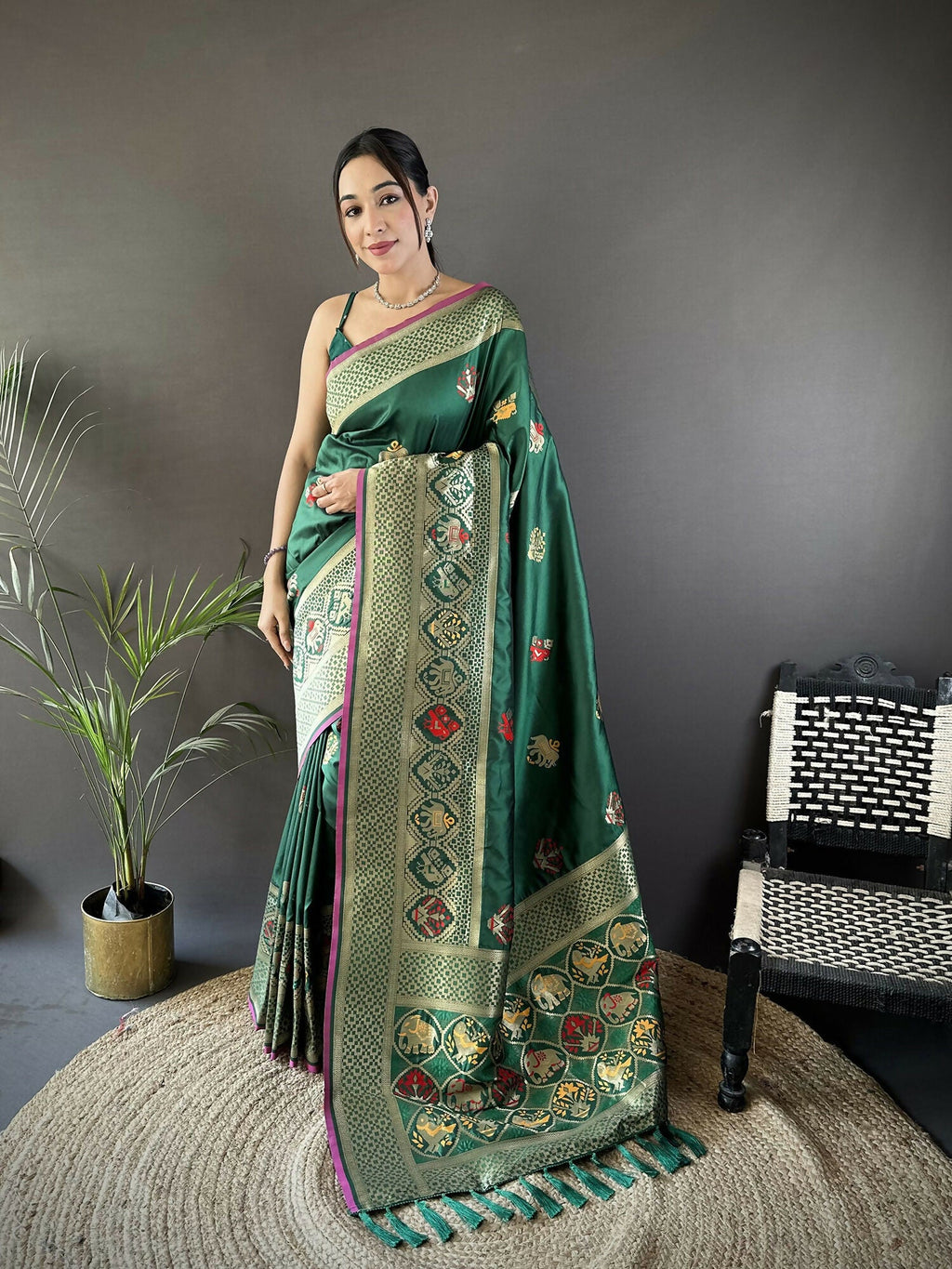 Green Banarasi Saree with elephant and floral motifs and red blouse