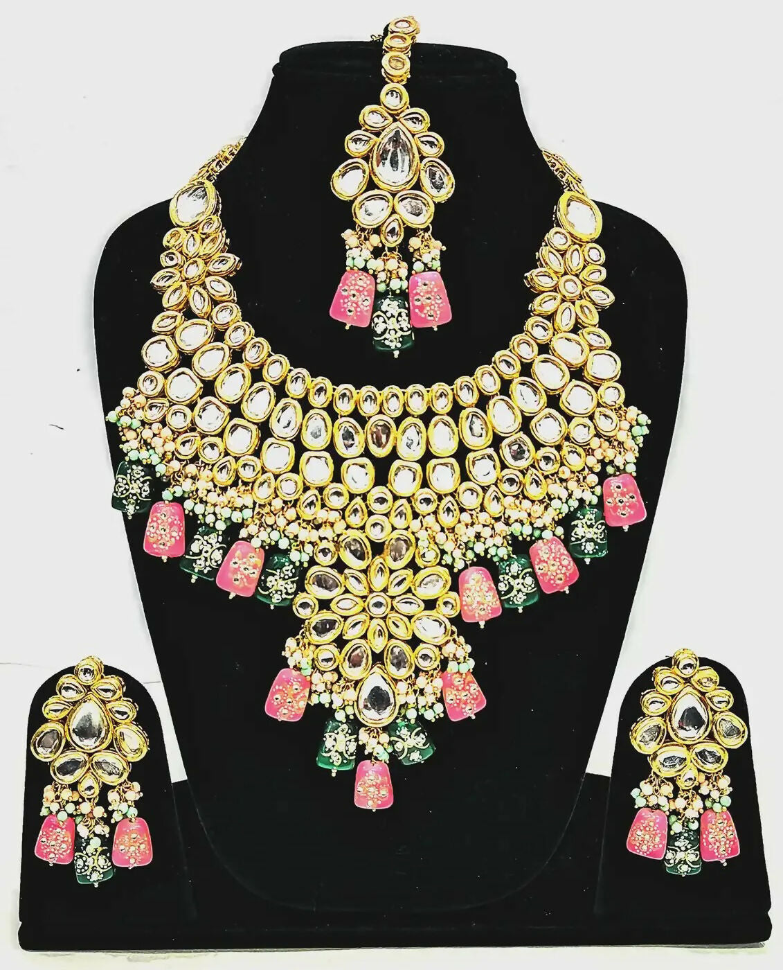 Detailed shot of a handcrafted Kundan necklace set with gold plating