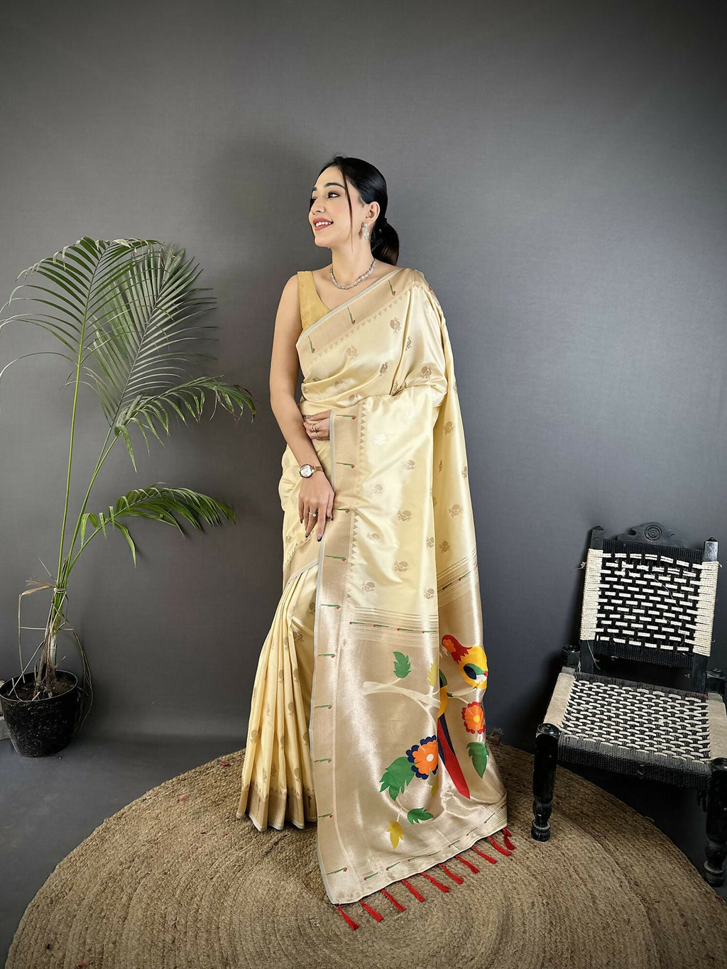 Off-white soft silk Kanchipuram saree with peacock and floral motifs