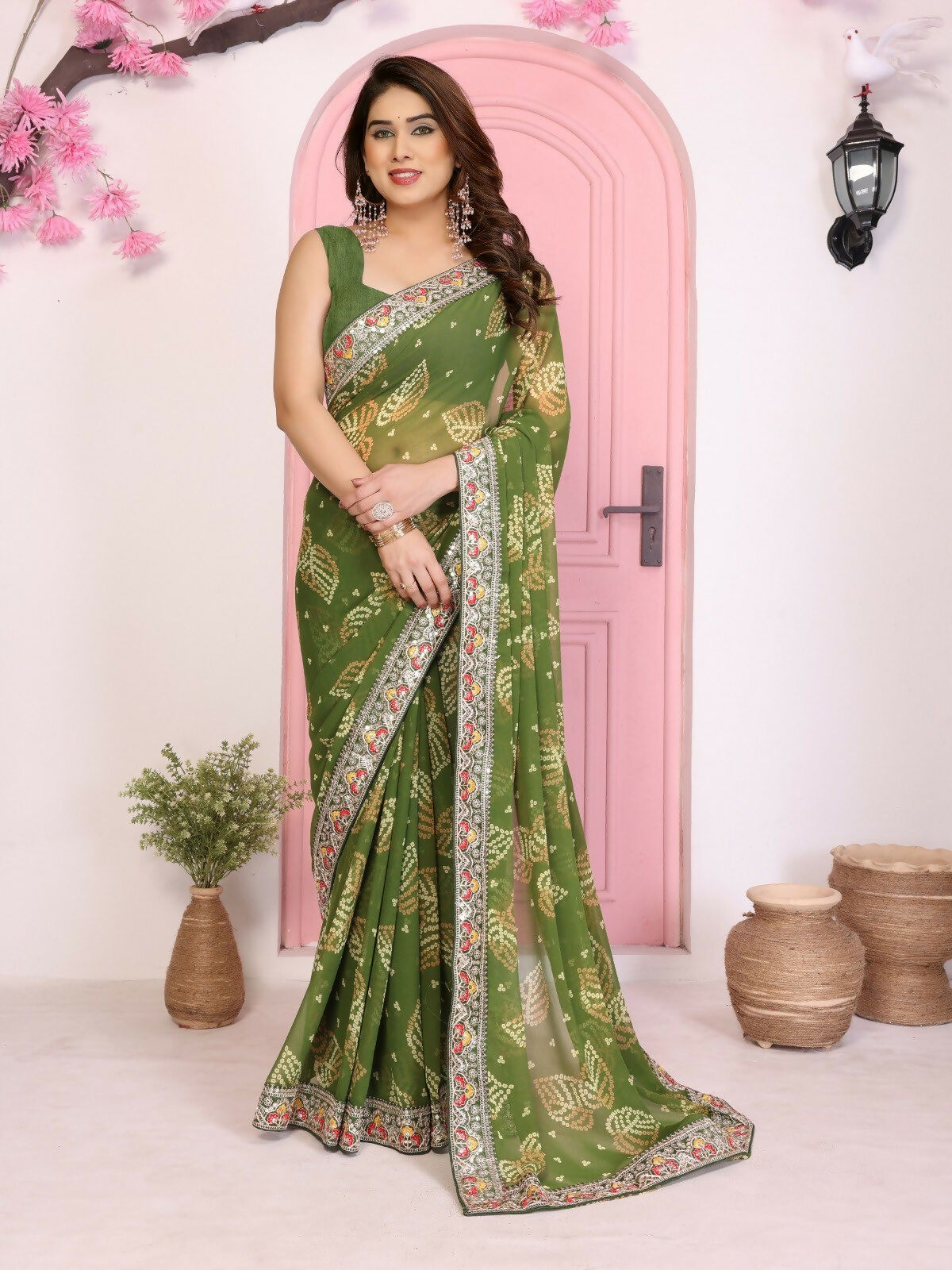 Elegant mehendi green georgette saree with traditional Rajwadi Bandhani print