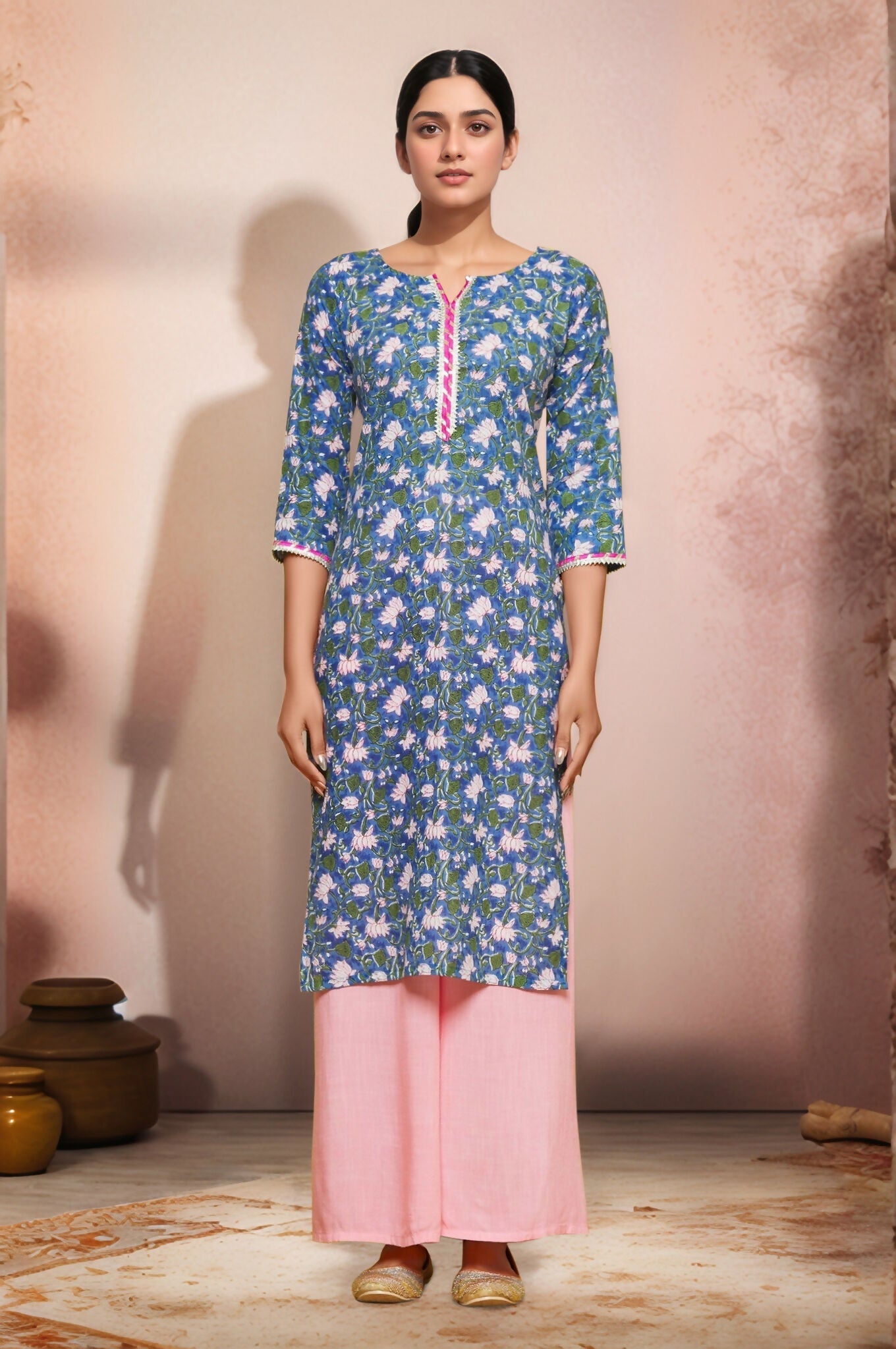 Blue flower printed cotton kurti with lace work on the neckline