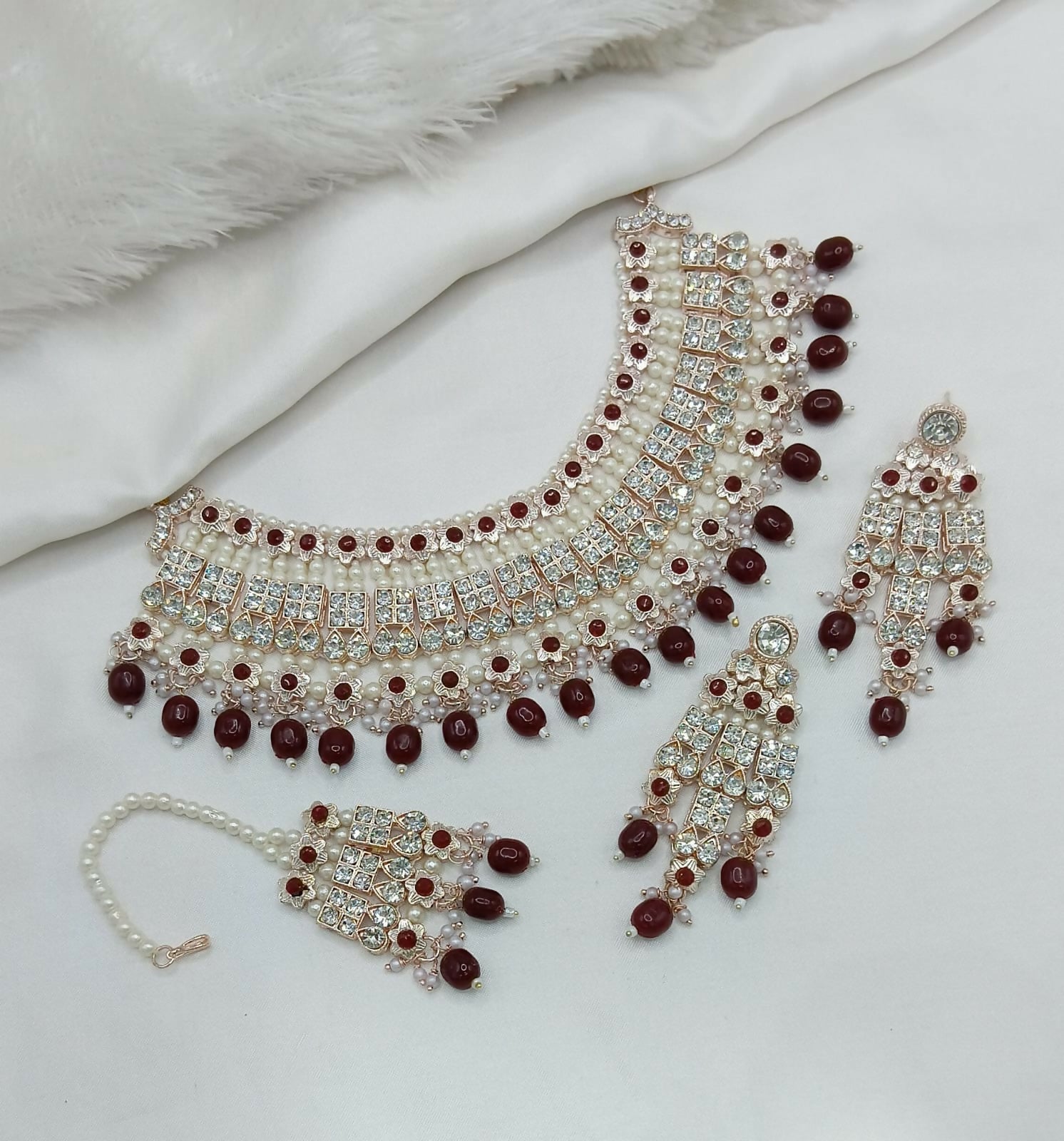 Maroon stone and pearl work necklace set with matching earrings