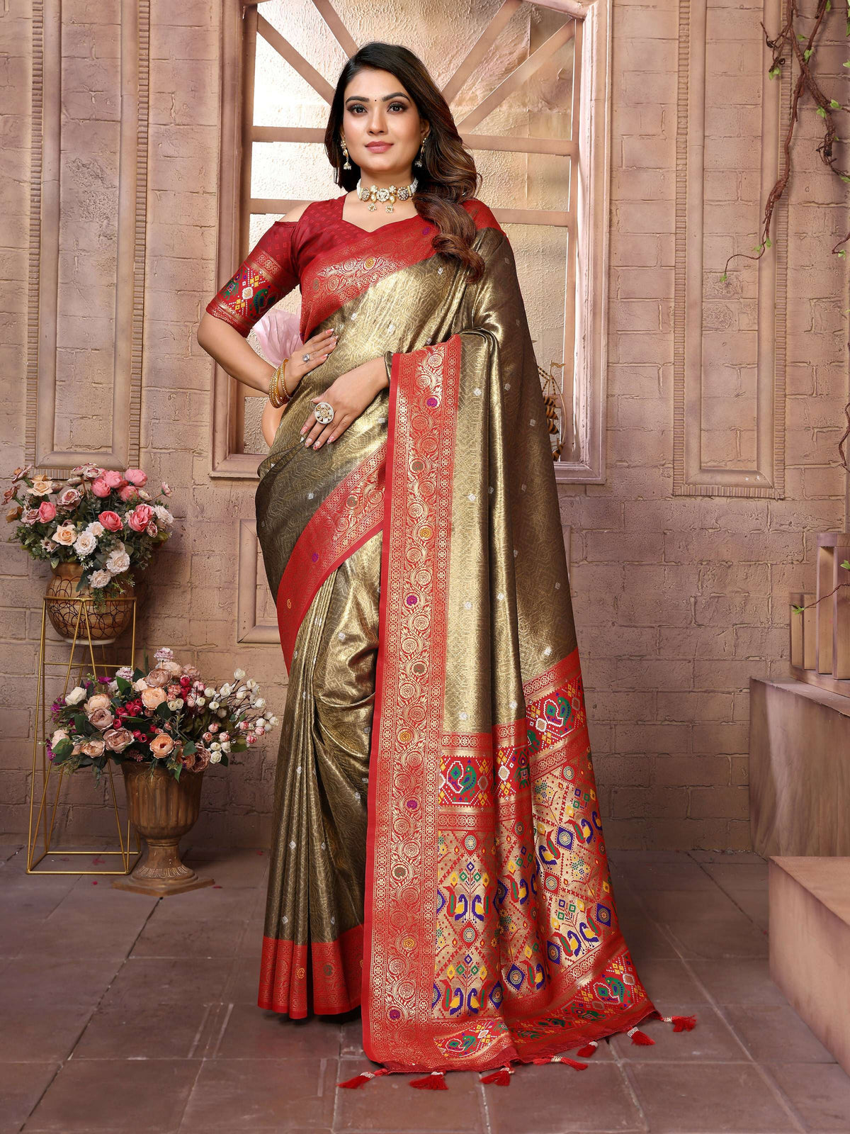 A beautiful brown Banarasi tissue silk saree featuring intricate traditional weaving patterns.