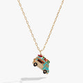 Gold-plated taco truck locket necklace with an open back revealing a tiny hot sauce charm