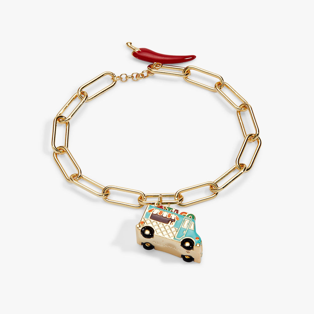 Gold-plated toggle bracelet with an enameled taco truck charm and pepper bar.