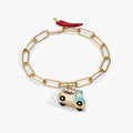 Gold-plated toggle bracelet with an enameled taco truck charm and pepper bar.