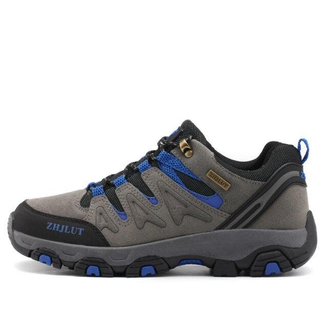 Unisex low-top hiking boots in olive green with a rugged multi-directional rubber outsole.
