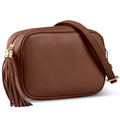 Structured horizontal pebbled calf leather crossbody bag with a tassel zipper.