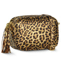 Leopard-print metallic suede crossbody bag with tassel and detachable strap.
