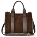 Dark brown structured Italian suede tote bag with leather accents and top handles.