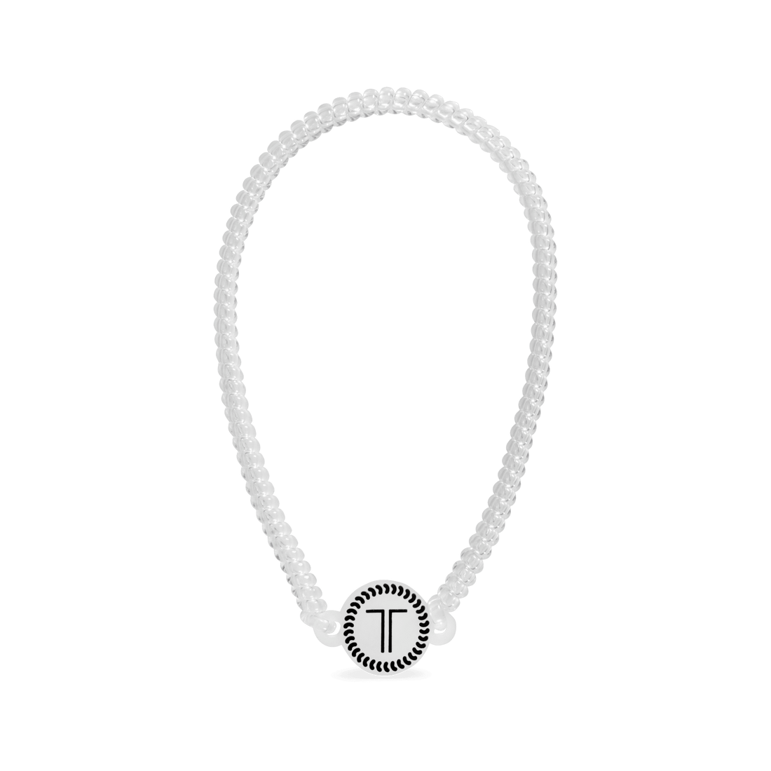 Crystal Clear spiral headband in transparent plastic with a white branded disc on a neutral background.