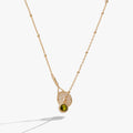 Tennis Racket Y-Necklace featuring a channel-set peridot stone and adjustable ball cable chain