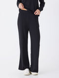 A pair of solid black, high-rise, wide-leg lounge pants in a soft knit fabric.