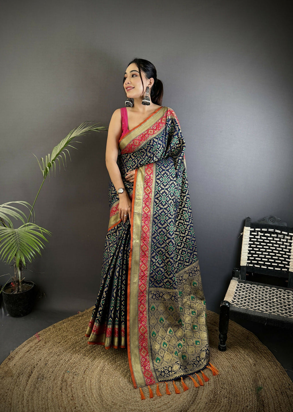 Navy blue soft silk saree with traditional Patola patterned weaving