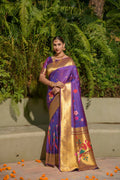 Elegant purple Paithani silk saree with intricate gold zari woven borders and matching blouse