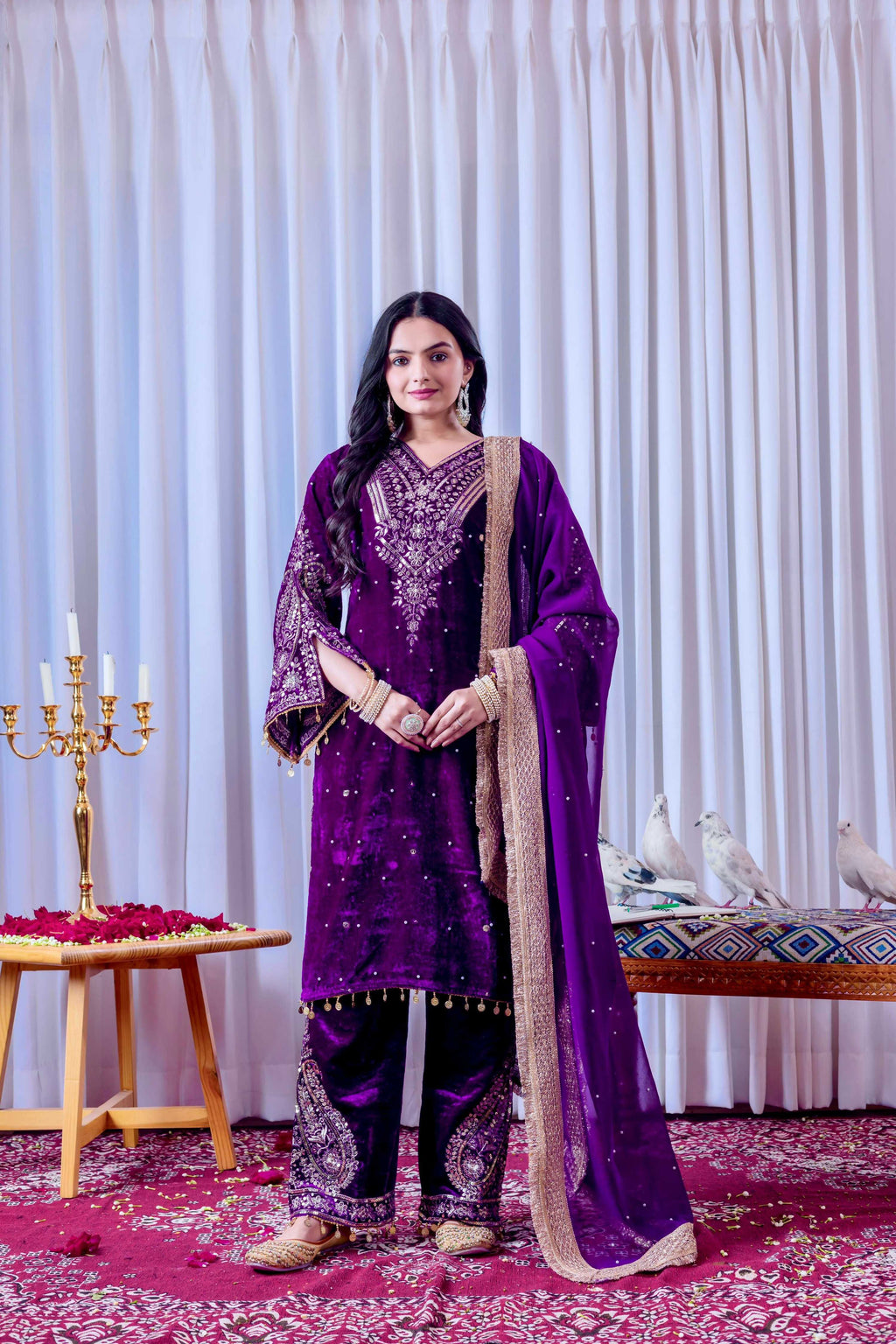 Royal purple velvet kurta set with intricate embroidery detailing