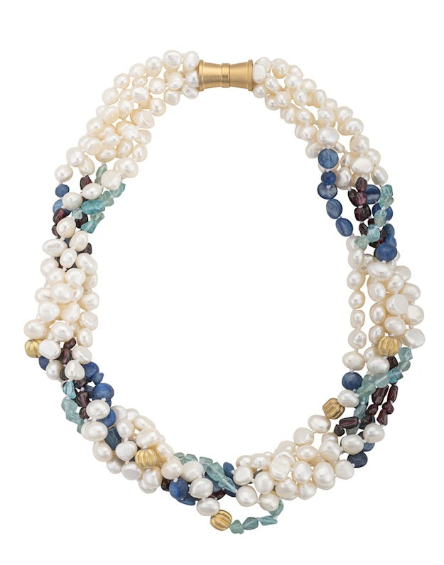 A 5-strand necklace featuring white freshwater pearls, red garnet, blue kyanite, and green tourmaline beads with a gold-tone magnetic clasp.