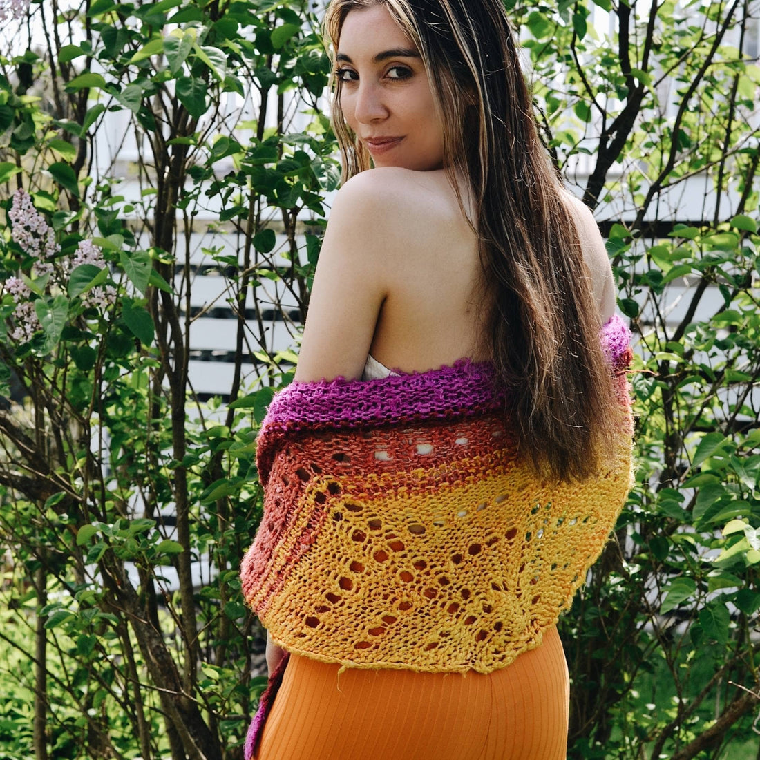 Close up of an ombre lace shawl made from Banana Fiber Yarn using the That Sunset Was Bananas! pattern.