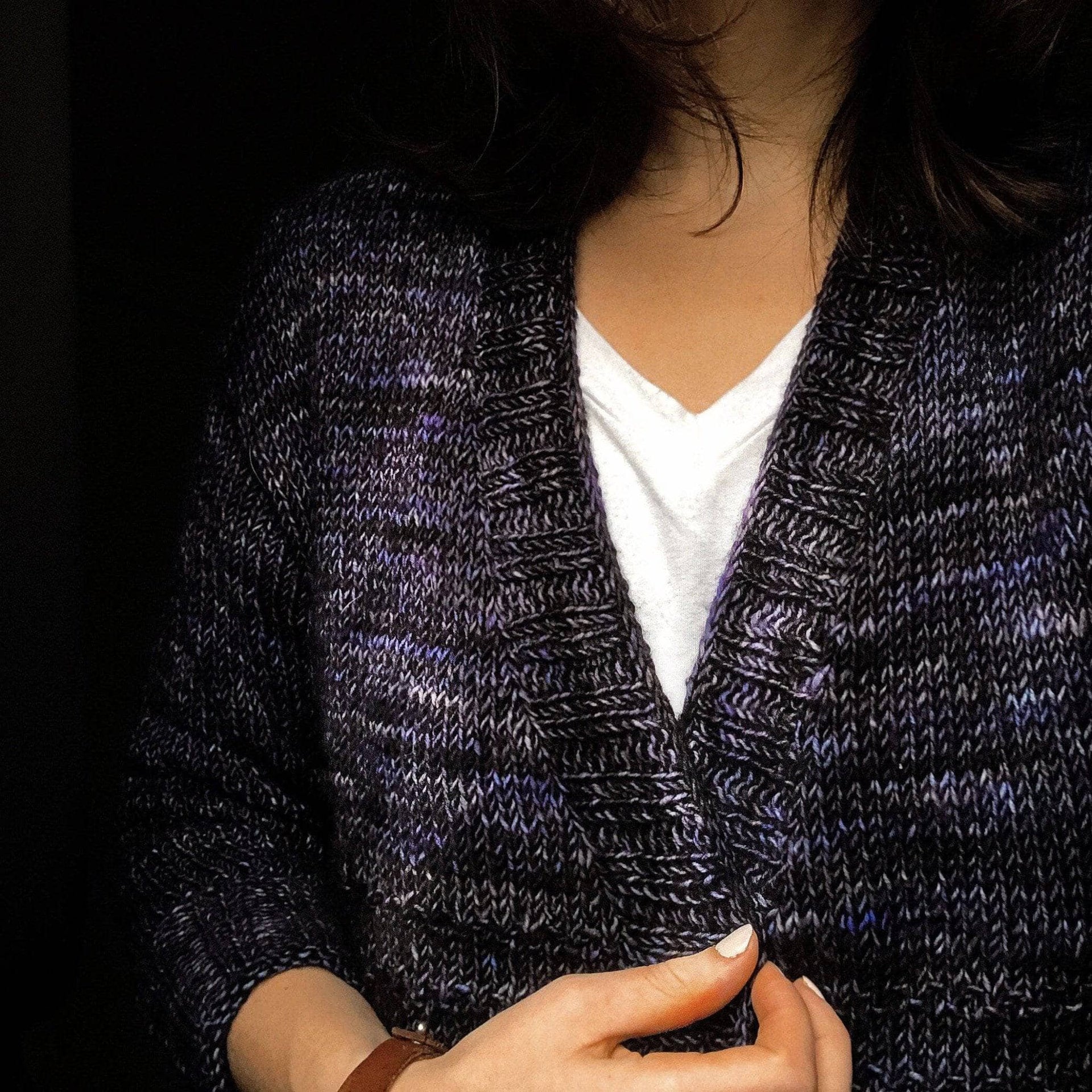 A soft, loose-gauge cozy cardigan styled as a winter layering piece, created from The Cozy Cardigan Knitting Kit.
