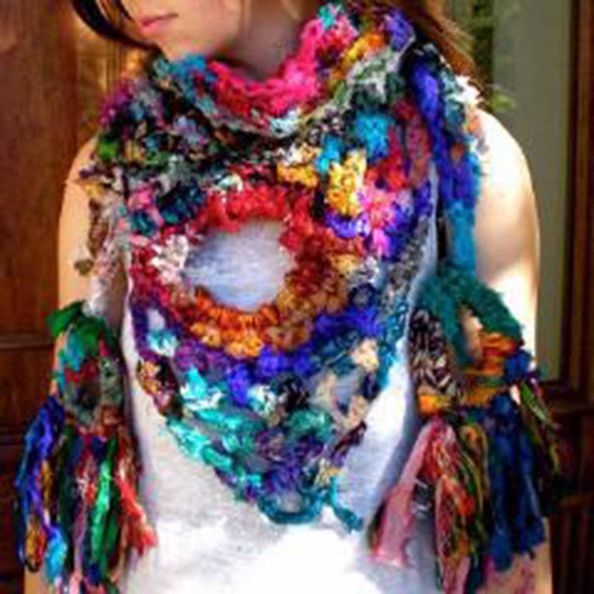 The Eye of Creativity crochet pattern showcase featuring shawl and scarf