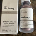 Bottle of The Ordinary AHA 30% + BHA 2% Peeling Solution with minimalist white and brown labeling.