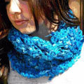 Close up of the Sara Cowl knitted with colorful Sari Silk Ribbon