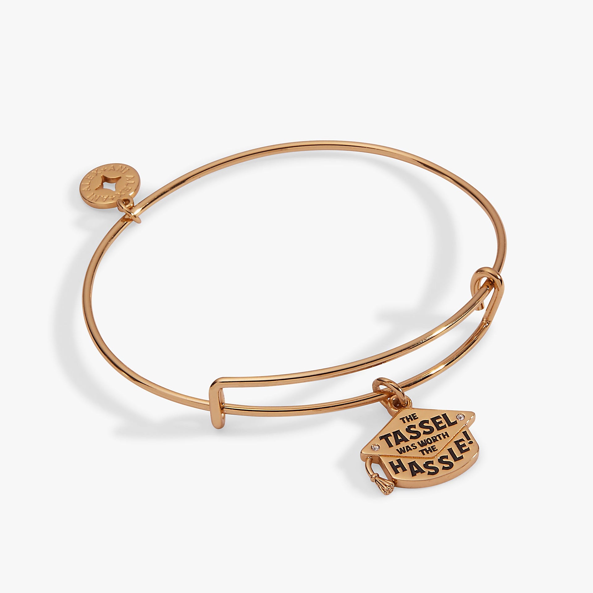 Close-up of The Tassel Was Worth The Hassle graduation charm bangle with crystal accent and polished metallic finish.