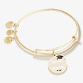 Graduation charm bangle featuring gold and silver tones with graduation-themed engraving.
