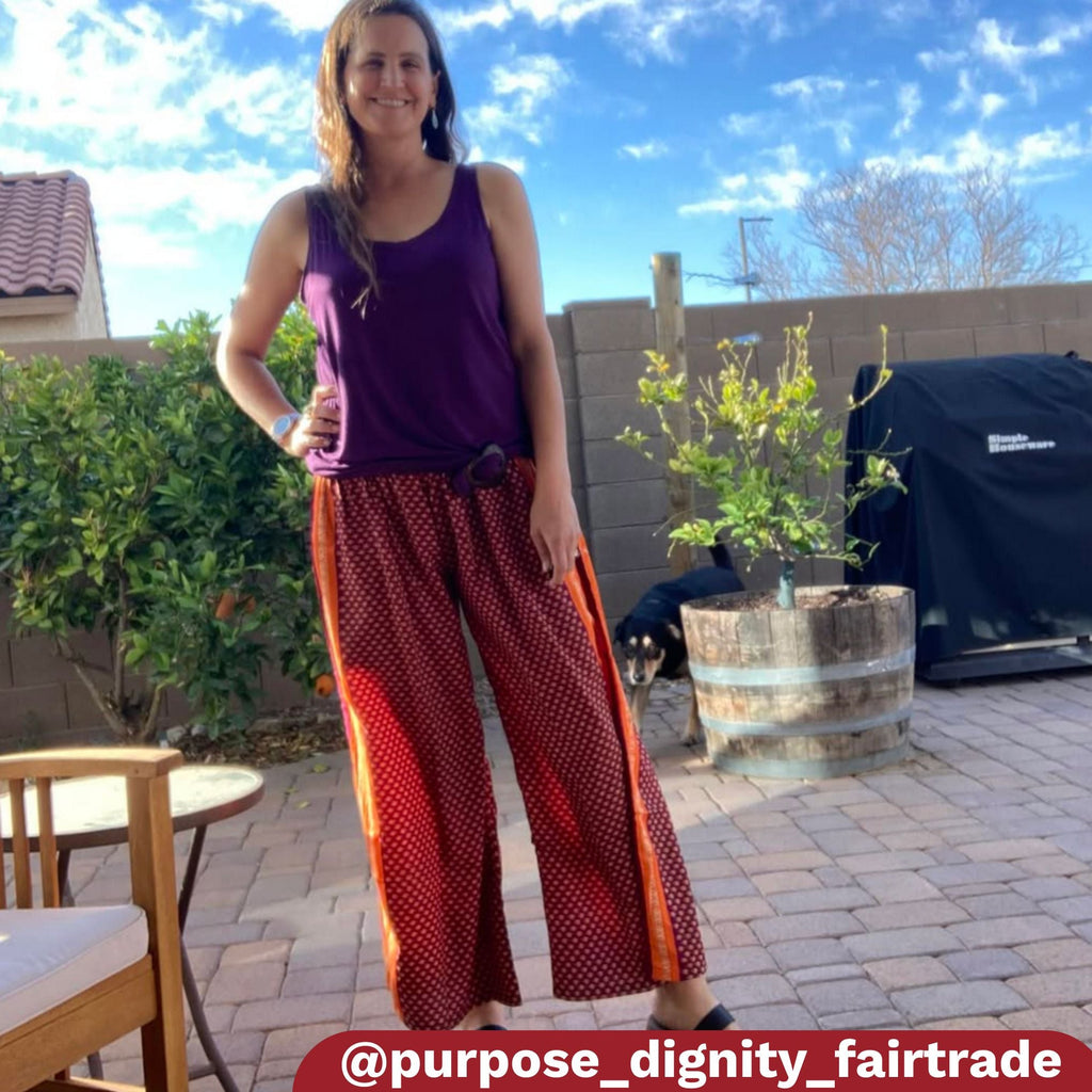 Model wearing flowing Free Spirit Wide-Leg Palazzo Pants with front pockets in a bohemian style