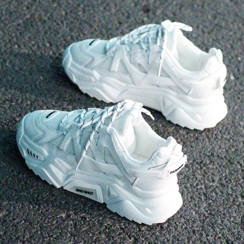 Stevvex women's white platform sneakers with blue and orange mesh accents and lace-up closure.