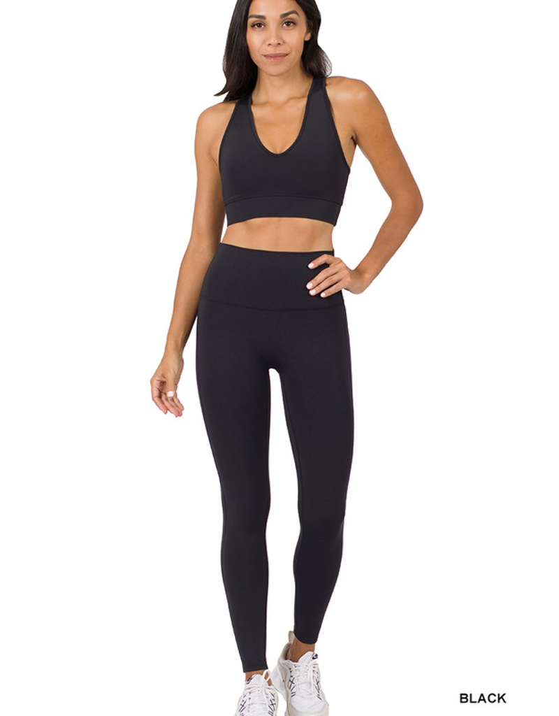Athletic Racerback Tank Top in Black styled for a workout session