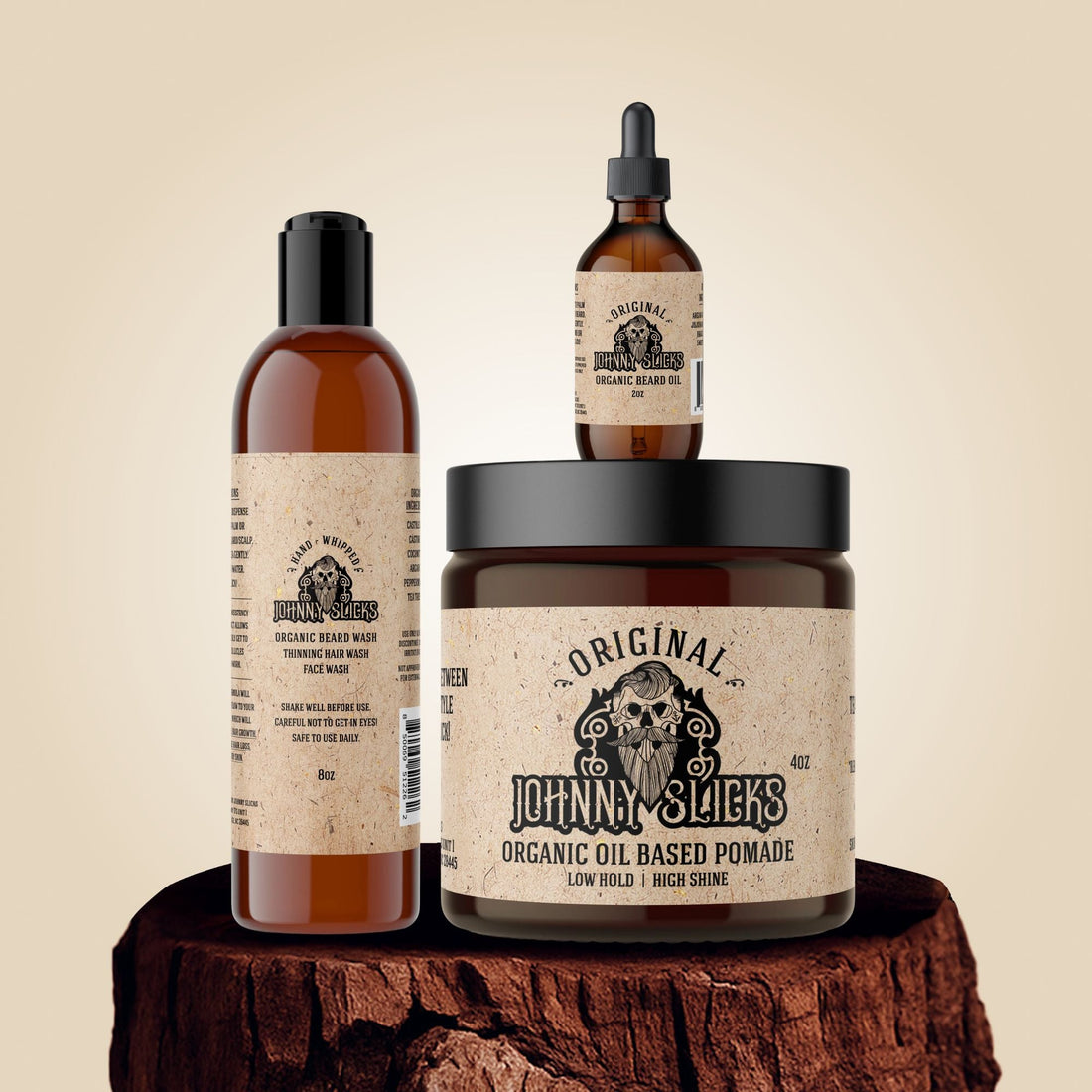 Johnny Slicks Thinning Hair Kit featuring organic beard wash, oil-based pomade, and beard oil on a wooden display base.