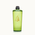 A translucent green 16 FL OZ bottle of Thymes Frasier Fir Dishwashing Liquid with a metallic gold pine tree icon.