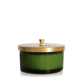 Thymes Frasier Fir 4-Wick Candle in a deep green glass jar with a brushed gold lid.