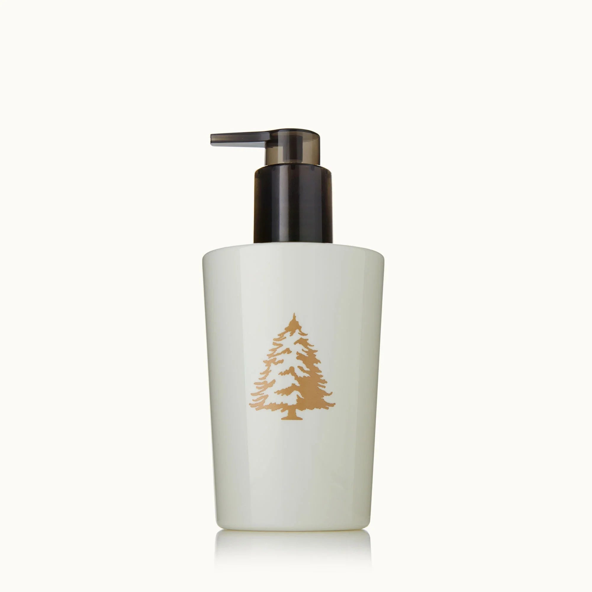 Thymes Frasier Fir Hand Lotion 8.25 FL OZ bottle featuring iconic evergreen branding