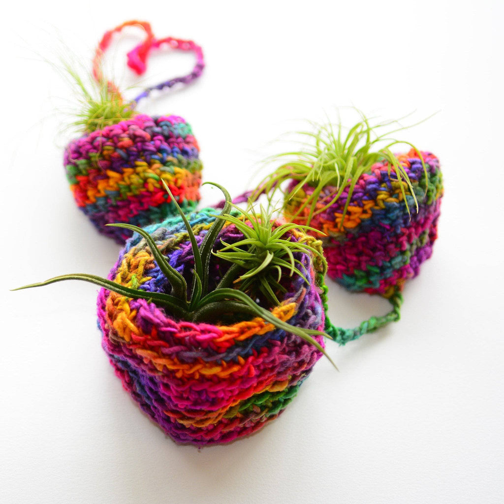 Tiered Air Plant Hanger display showing intricate knit and crochet textures in silk yarn.
