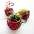 Tiered Air Plant Hanger display showing intricate knit and crochet textures in silk yarn.