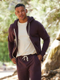 Men's Core Triblend Fleece Zip Hoodie in dark purple with off-white drawstrings and front pockets.