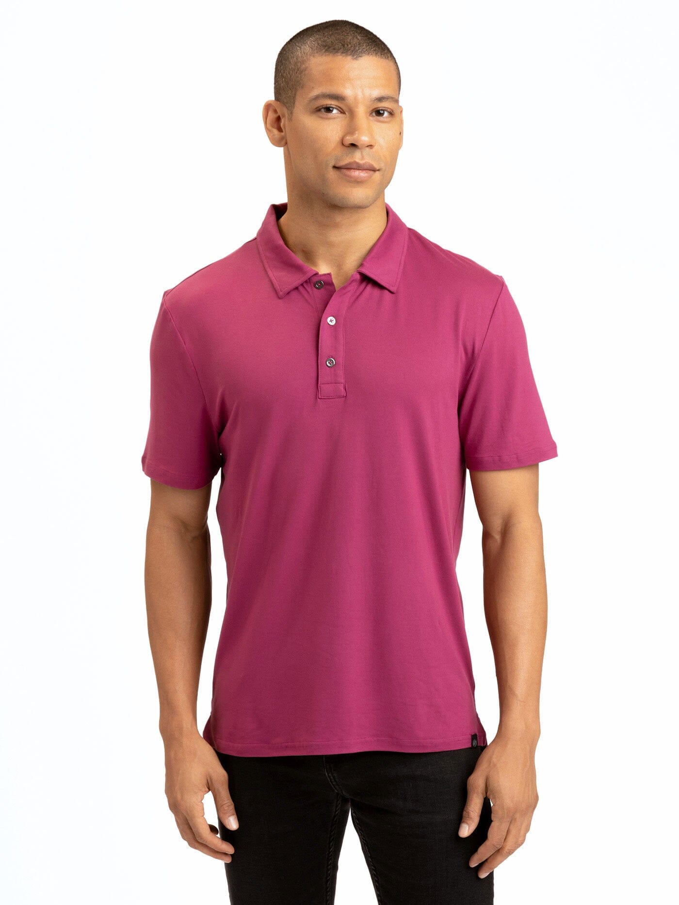 Men wearing a soft magenta and berry jersey knit polo shirt