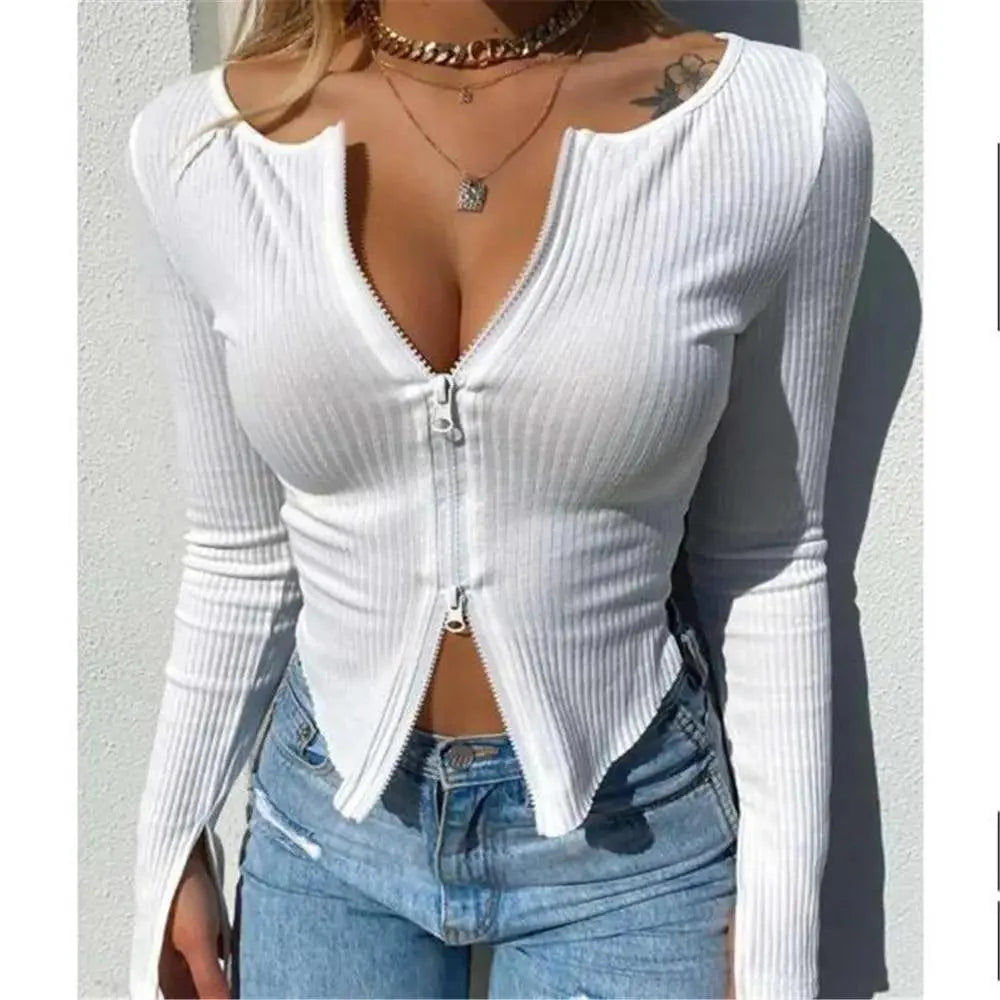 Minimalist ribbed knitted long sleeve crop top with a zipper detail available in black, white, and burgundy.