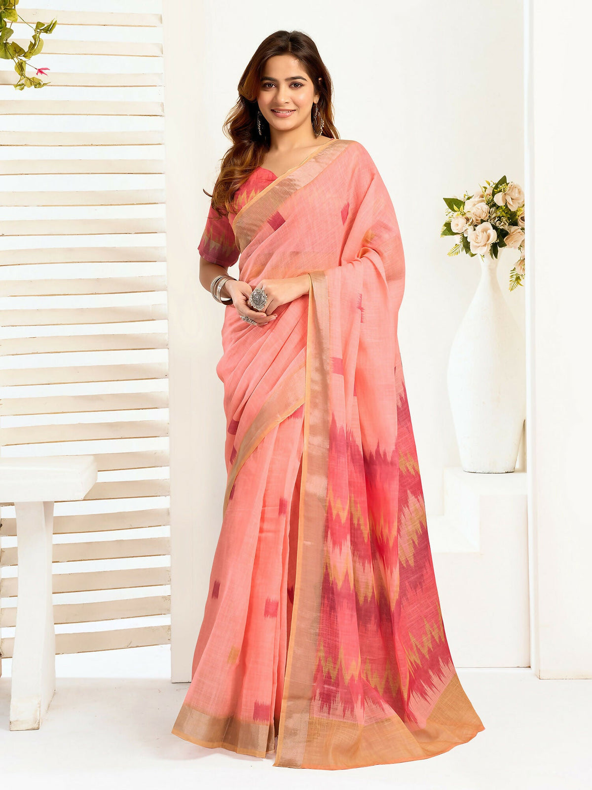 Peach Ikkat pattern linen ready-to-wear saree with matching unstitched blouse