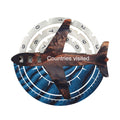 3D wooden world map in Dune color scheme with brown, blue, and silver accents on a wall