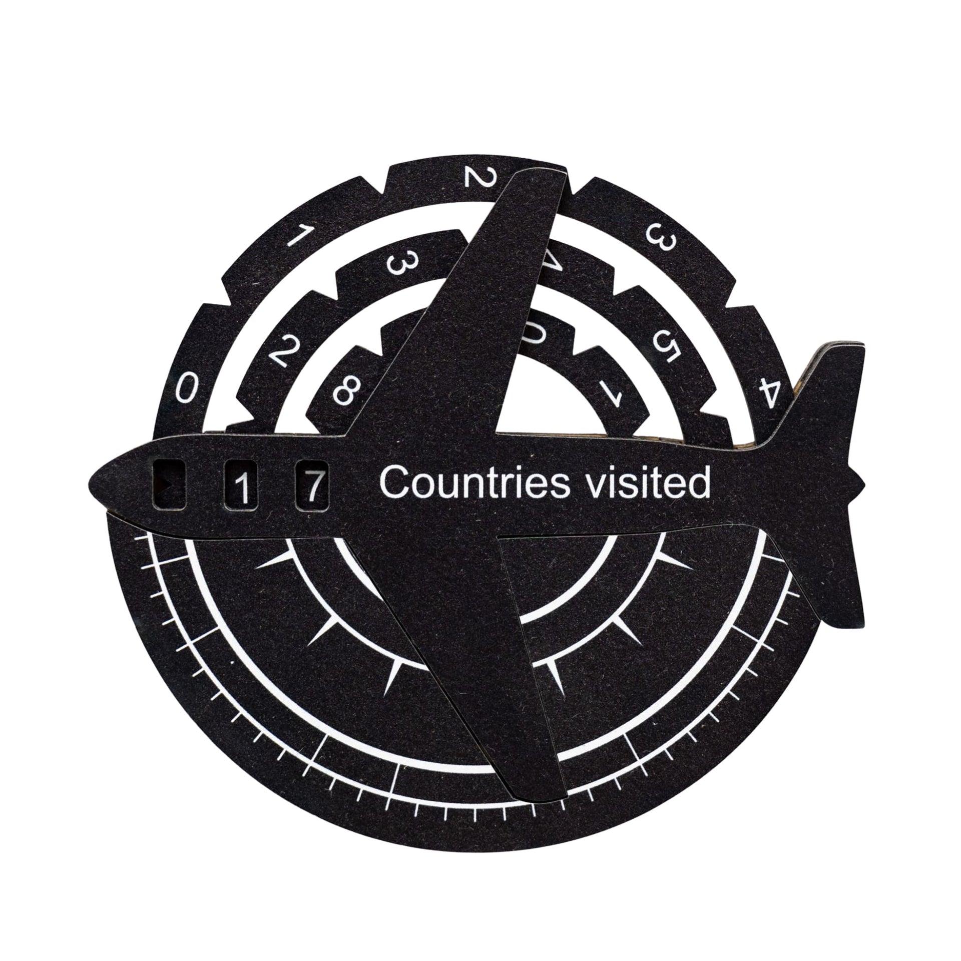 Modern black and white 3D wooden world map used as a travel tracker.
